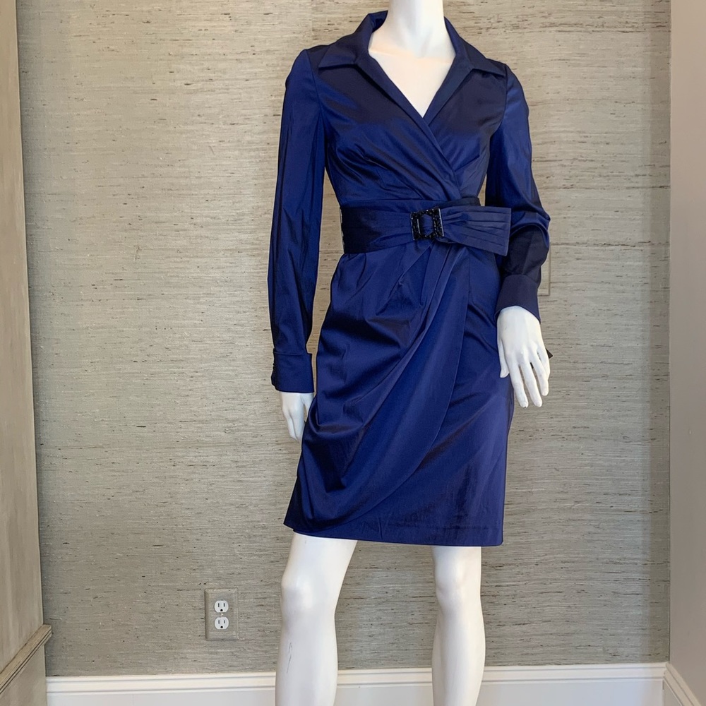 Long sleeve, collared cocktail dress.